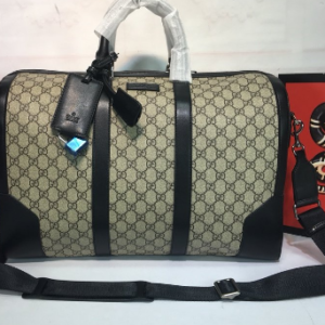 Gucci Beige GG Supreme Canvas Duffle Bag with black leather trim and strap
