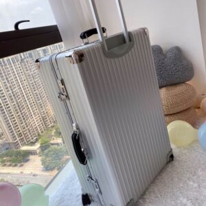 Rimowa Silver Aluminum Multi Size Suitcase with spinner wheels in 20 26 and 29 inch options