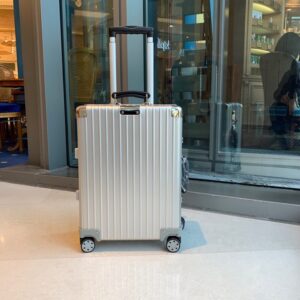Rimowa White Aluminum Classic Suitcase with spinner wheels available in multiple sizes