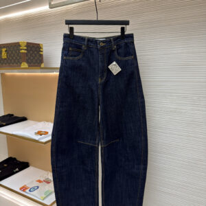 oewe Dark Blue Jeans with wide-leg silhouette, dark indigo wash, and contrast stitching