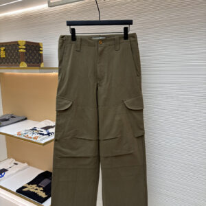 Front and back view of Acne Studios Olive Green Cargo Trousers featuring multi-pocket utility design on a display hanger.