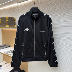 Front view of the Acne Studios x Kappa Black Track Jacket featuring embroidered dual branding and sleeve taping on a display hanger.