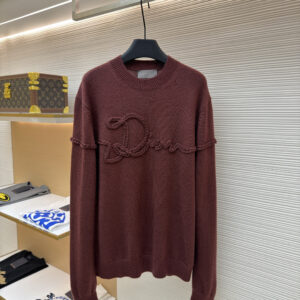 A luxury Dior Brown Braided Logo Sweater displayed on a black hanger, showing the front view with braided rope detailing.