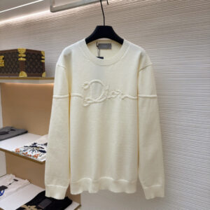 A luxury Dior Cream Braided Logo Sweater displayed on a black hanger, showing the front view with braided rope detailing and the clean back view.