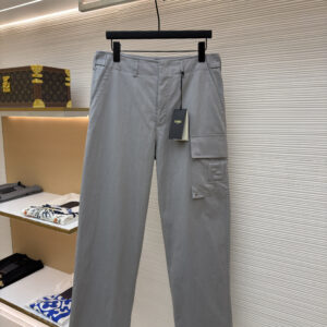 A pair of Fendi Grey FF Motif Cargo Trousers hanging on a black hanger, showing the embossed logo on the side pocket and the clean straight-leg cut.