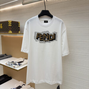 A premium white Fendi Roma Embellished Logo Cotton Tee featuring a 3D-effect leopard print logo hanging in a high-end boutique.