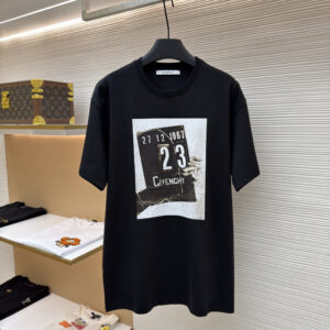 A premium Givenchy Black Graphic Print T-Shirt in black, hanging on a black hanger, displaying a large white and black graphic print on the front.