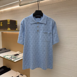 A premium Louis Vuitton Blue Monogram Knit Polo in sky blue featuring an all-over tonal jacquard monogram pattern and a chest pocket.