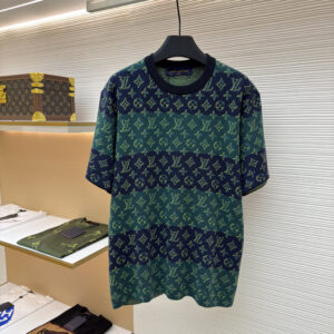 A premium Louis Vuitton Green Monogram Striped T-Shirt with emerald and forest green stripes and an all-over jacquard monogram, hanging on a black hanger showing front and back views.