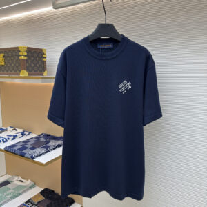 A premium Louis Vuitton Men’s Navy Technical Knit Embroidered Signature T-Shirt in navy blue, hanging on a black hanger, showing the front view with embroidered branding and a clean back view