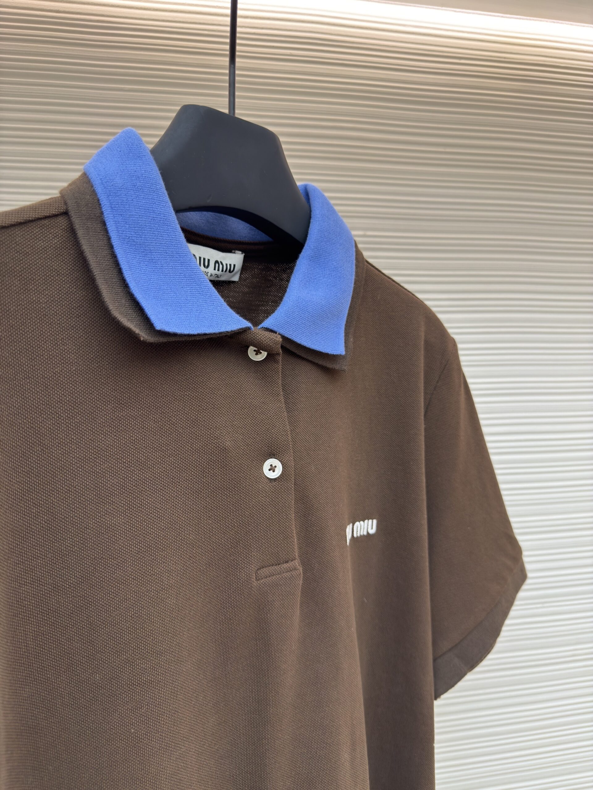 #MiuMiu, #PoloShirt, #ContrastCollar, #PreppyAesthetic, #LuxuryInterpretation, #2026Fashion, #DesignerStyle