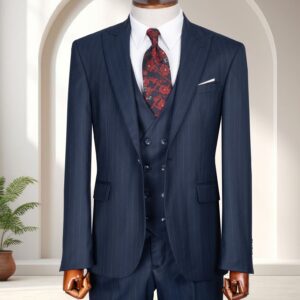 A man’s navy blue pinstripe three-piece slim-fit suit featuring a double-breasted waistcoat and a red floral patterned tie on a mannequin.