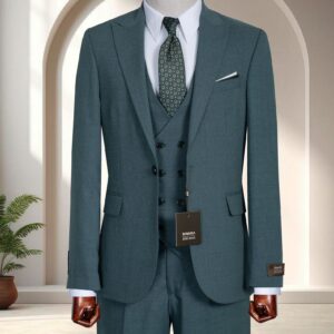 A Premium Teal Micro-Weave Three-Piece Suit featuring a double-breasted waistcoat and patterned olive tie on a wooden mannequin.