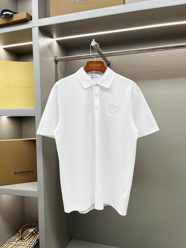 Men's solid white short-sleeve polo shirt with a tonal embroidered crest logo on the left chest, hanging in a closet.