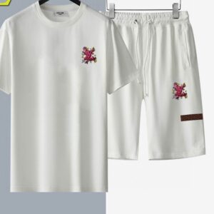A men's matching white two-piece casual apparel set including a crewneck t-shirt and elastic drawstring shorts, both detailed with a pink embroidered emblem.