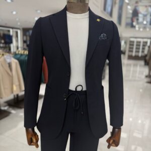 Man wearing a lightweight navy blue smart casual suit with a white crew-neck T-shirt, styled for summer weddings, business meetings, and elegant occasions.